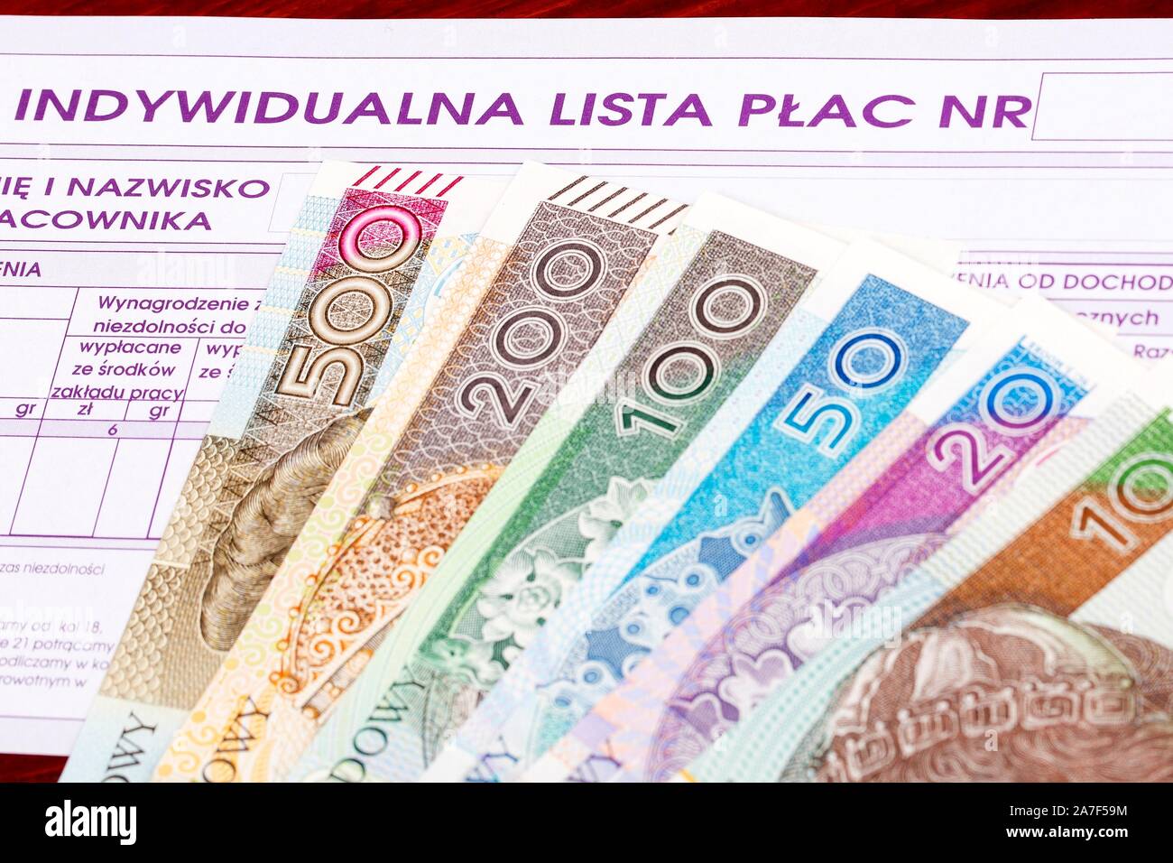 Il polacco payroll un documento con il denaro Foto Stock