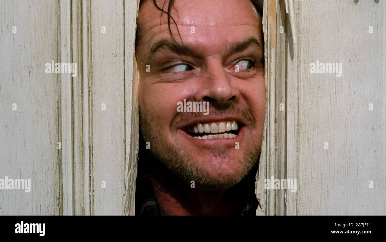 Jack Torrance giocato da Jack Nicholson dal lucido (1980) diretto da Stanley Kubrick. Grande schermo l'adattamento di Stephen King libro su un ragazzo con poteri psichici e di un padre della discesa in pazzia. Foto Stock