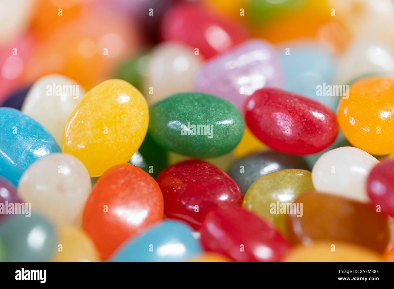 Macro closeup delle colorate jellybeans - dolci o caramelle Foto Stock