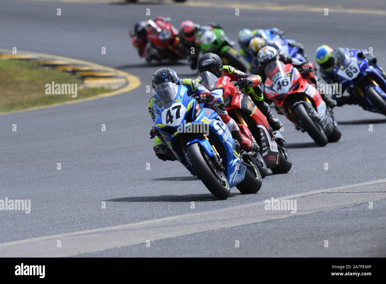 Superbike Wayne Maxwell porta il pacco fuori del turno 9 sulla Suzuki GSXR1000R durante le prime fasi della Australian Superbike Round 7 a Sydney Foto Stock