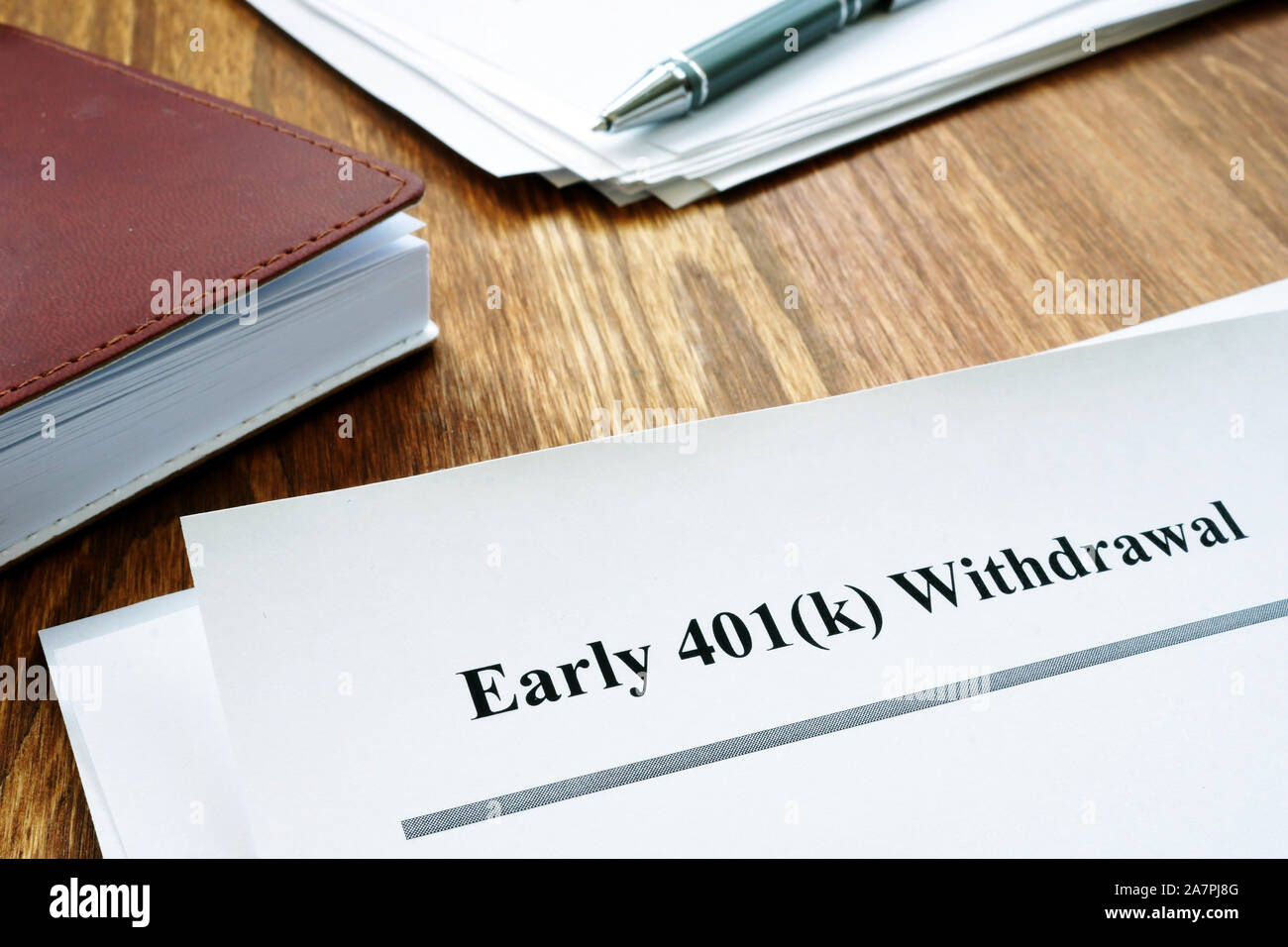 401k il ritiro precoce pena lettera e notebook. Foto Stock