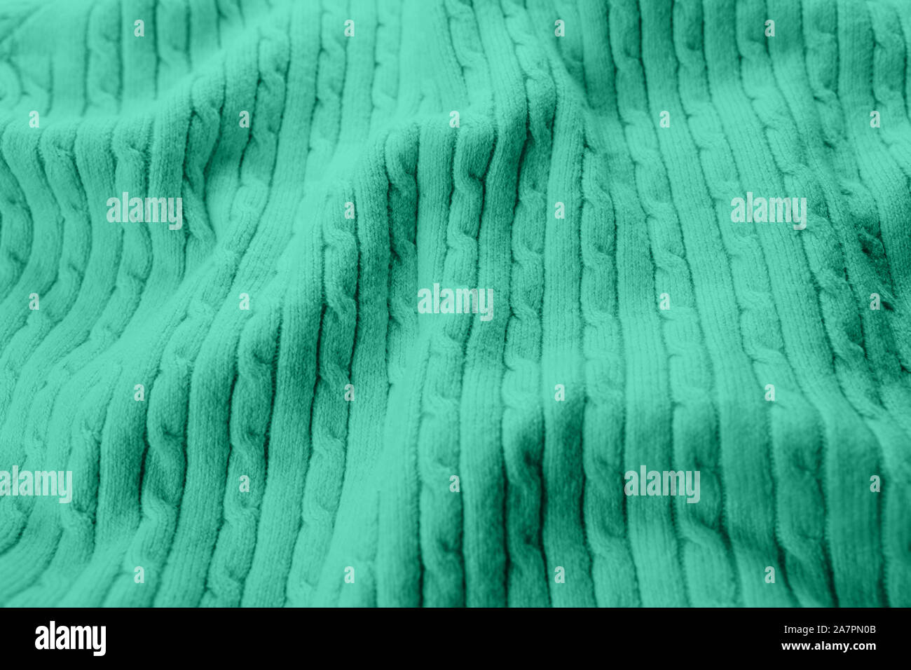 Colore trend 2020 menta. Abstract di menta nuovo colore di sfondo. Seafoam tessuto verde dello sfondo. Verde di tessitura del tessuto Foto Stock