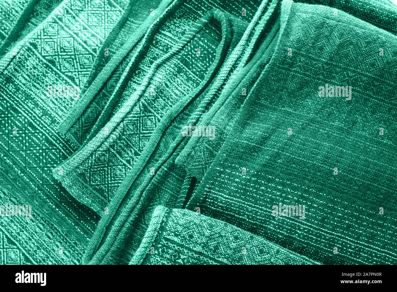 Colore trend 2020 menta. Abstract di menta nuovo colore di sfondo. Seafoam tessuto verde dello sfondo. Verde di tessitura del tessuto Foto Stock