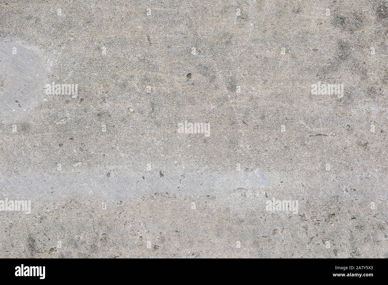 Vintage, vecchio cemento pattern sfondo irregolare. grigio cemento poroso texture. struttura del grigio vecchio muro di cemento. Foto Stock