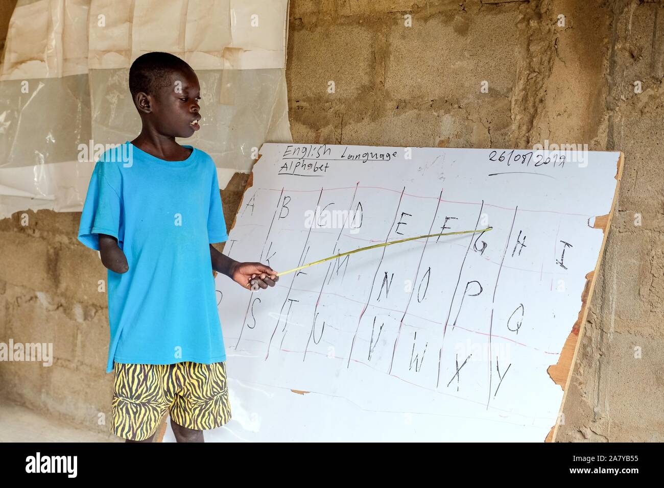 Insegnamento presso la scuola per bambini con handicap fisici e mentali del 'Nazareth Home per tutti i figli di Dio " della Chiesa Cattolica nel cantato / Ghana Foto Stock