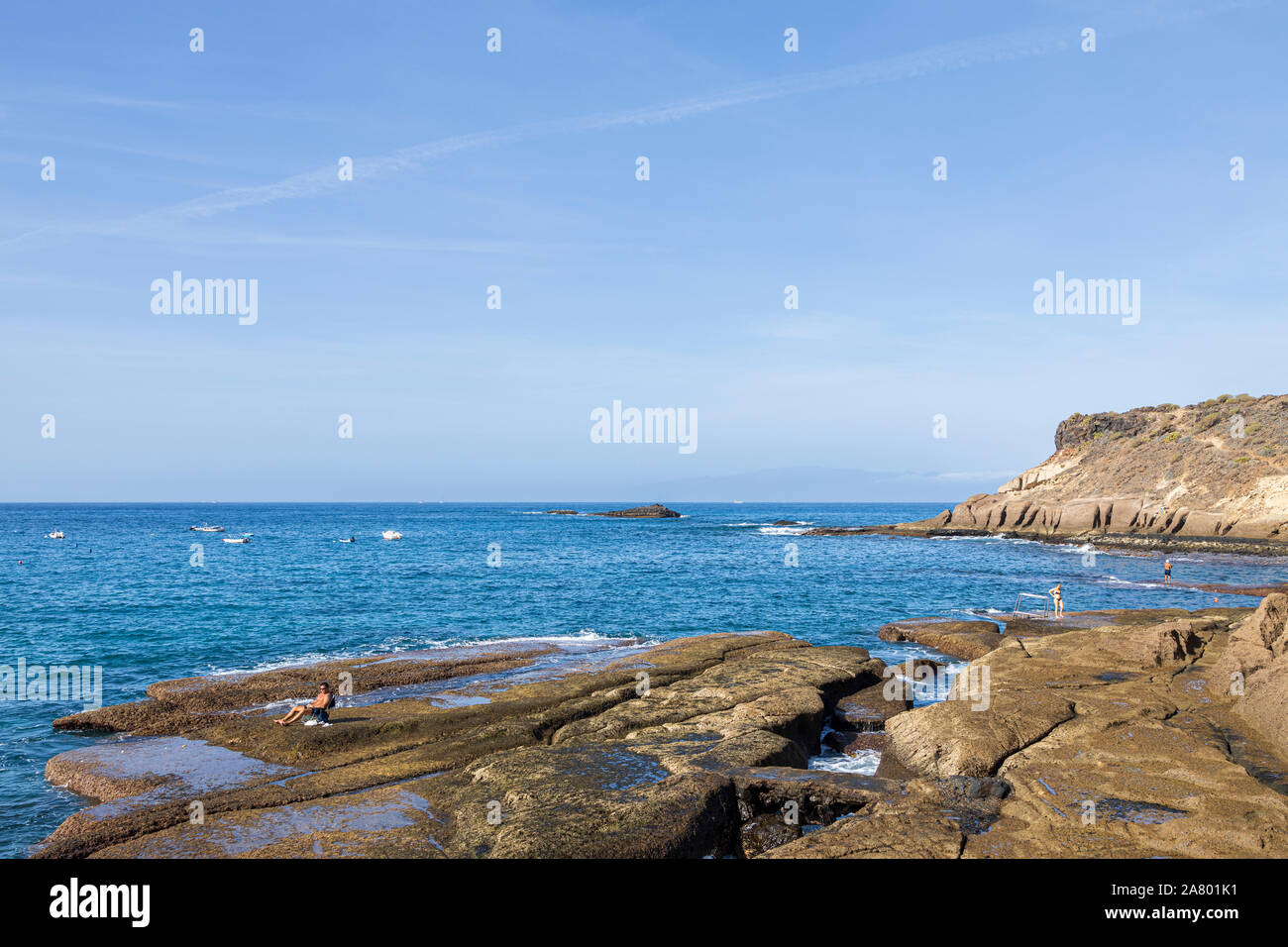 Lungomare roccioso nella prima mattinata a La Caleta, Costa Adeje, Tenerife, Isole Canarie, Spagna Foto Stock