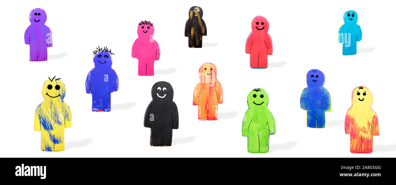 La testata e colorati di figure in legno con facce felici, concetto la diversità e la solidarietà, isolato Foto Stock
