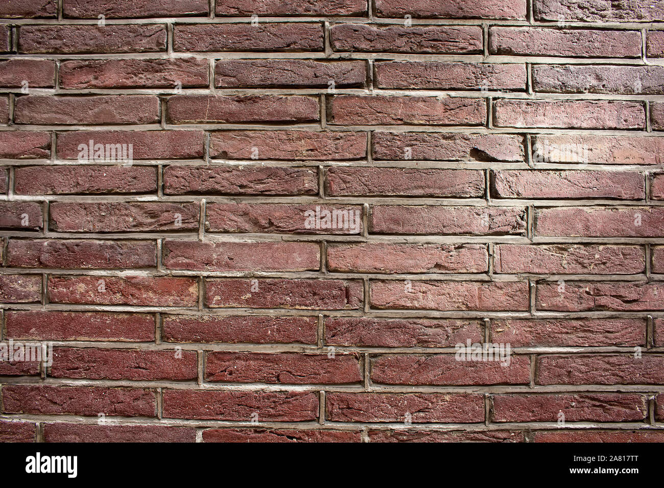 Vista ravvicinata di rosso / marrone un muro di mattoni. Foto Stock