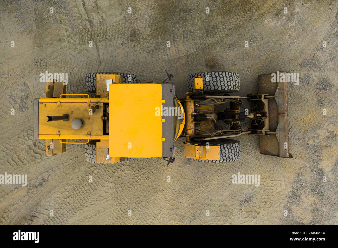 Caricatore frontale in un sito in costruzione Foto Stock