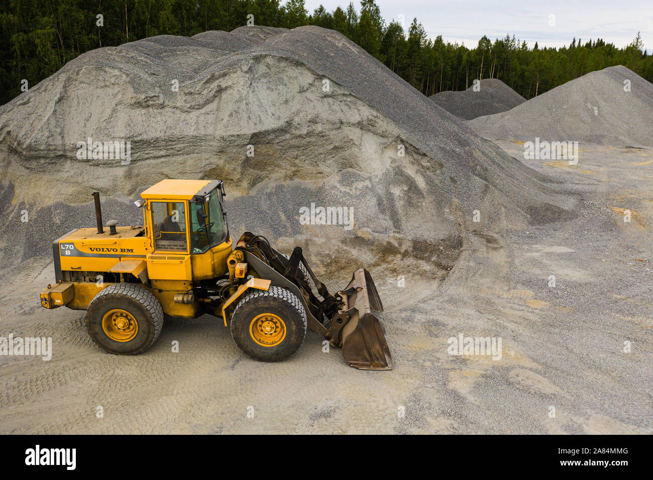Caricatore frontale in un sito in costruzione Foto Stock