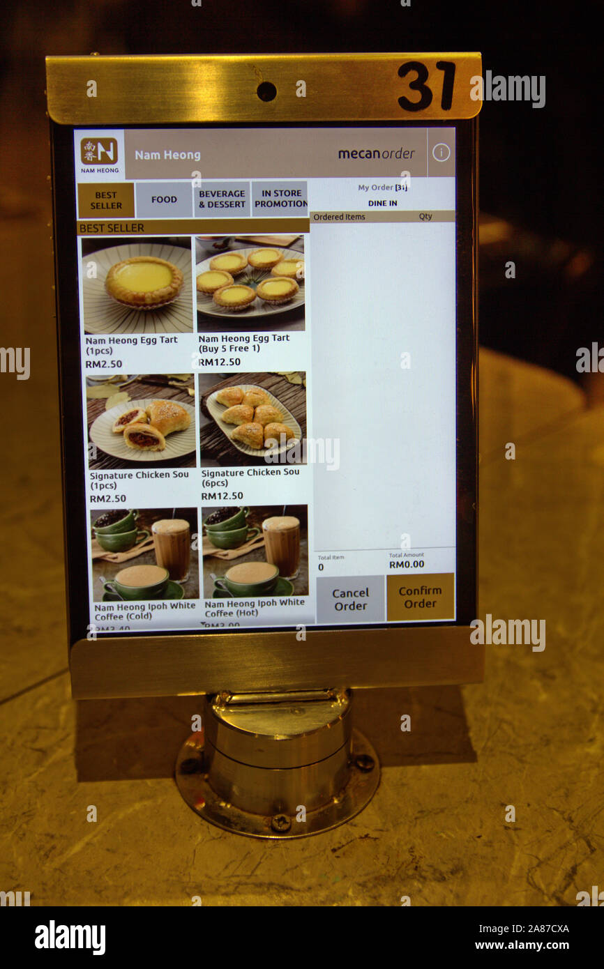 Menu tavoletta a Nam Heong ristorante robot in Ipoh, Perak, Malaysia Foto Stock