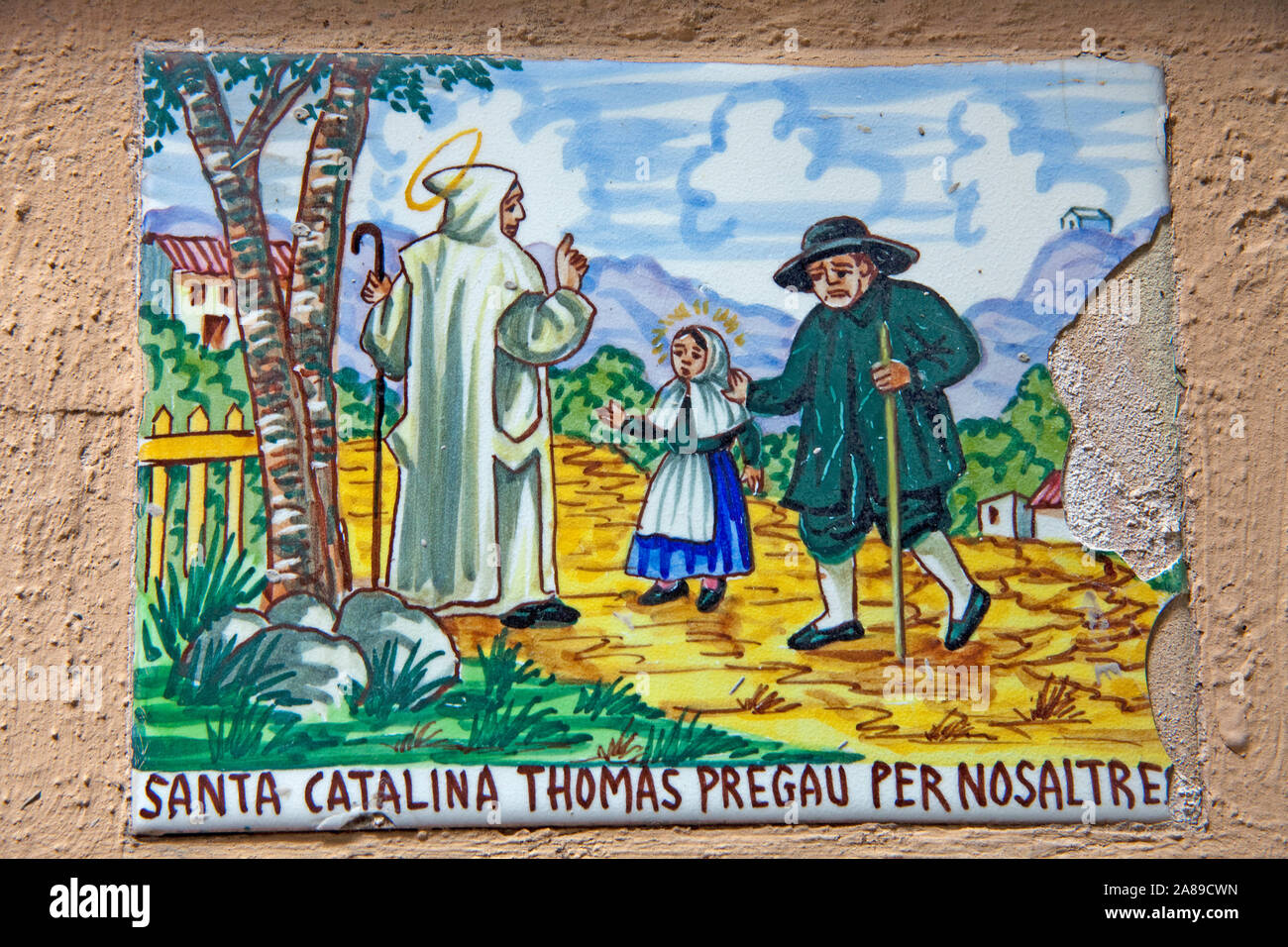 Immagine di piastrella con motivo santo al centro storico di Valldemossa, regione Comarca, Serra de Tramuntana, Maiorca, isole Baleari, Spagna Foto Stock