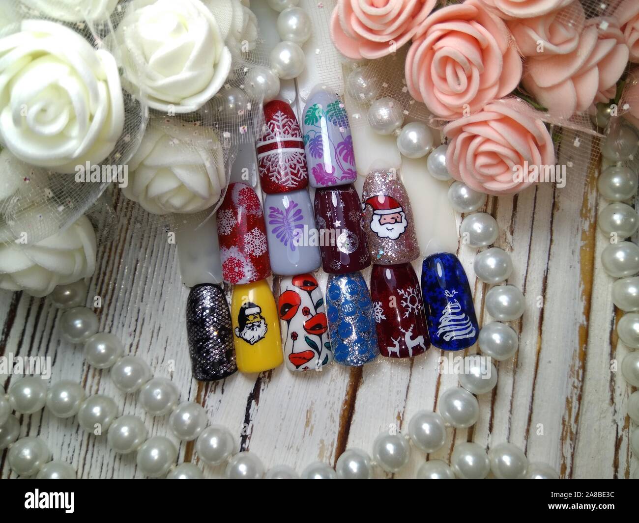 Natale disegni sulle unghie Foto Stock