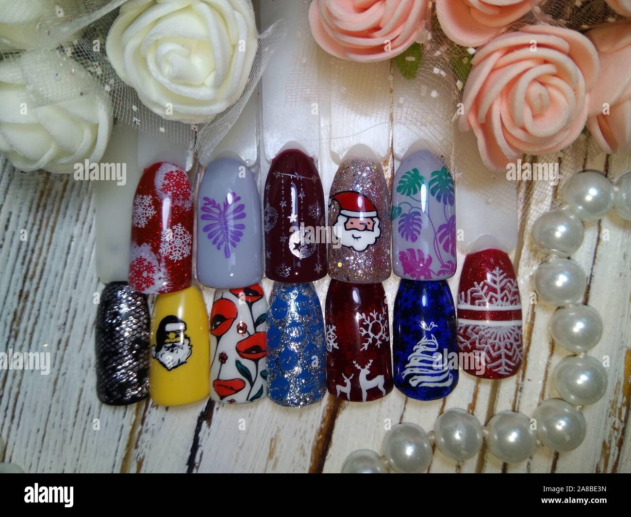 Natale disegni sulle unghie Foto Stock