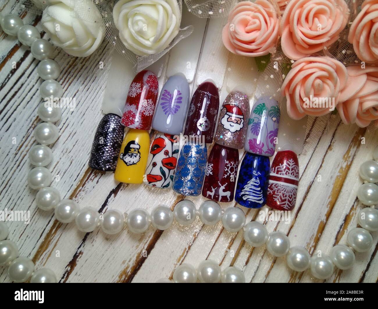 Natale disegni sulle unghie Foto Stock