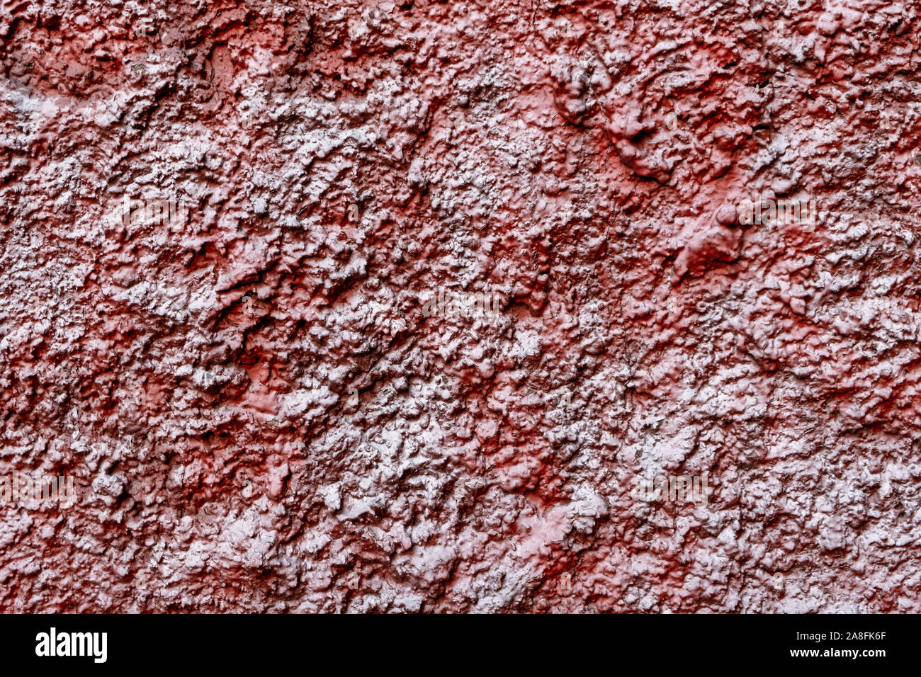 Rosso con cemento bianco sullo sfondo di texture Foto Stock