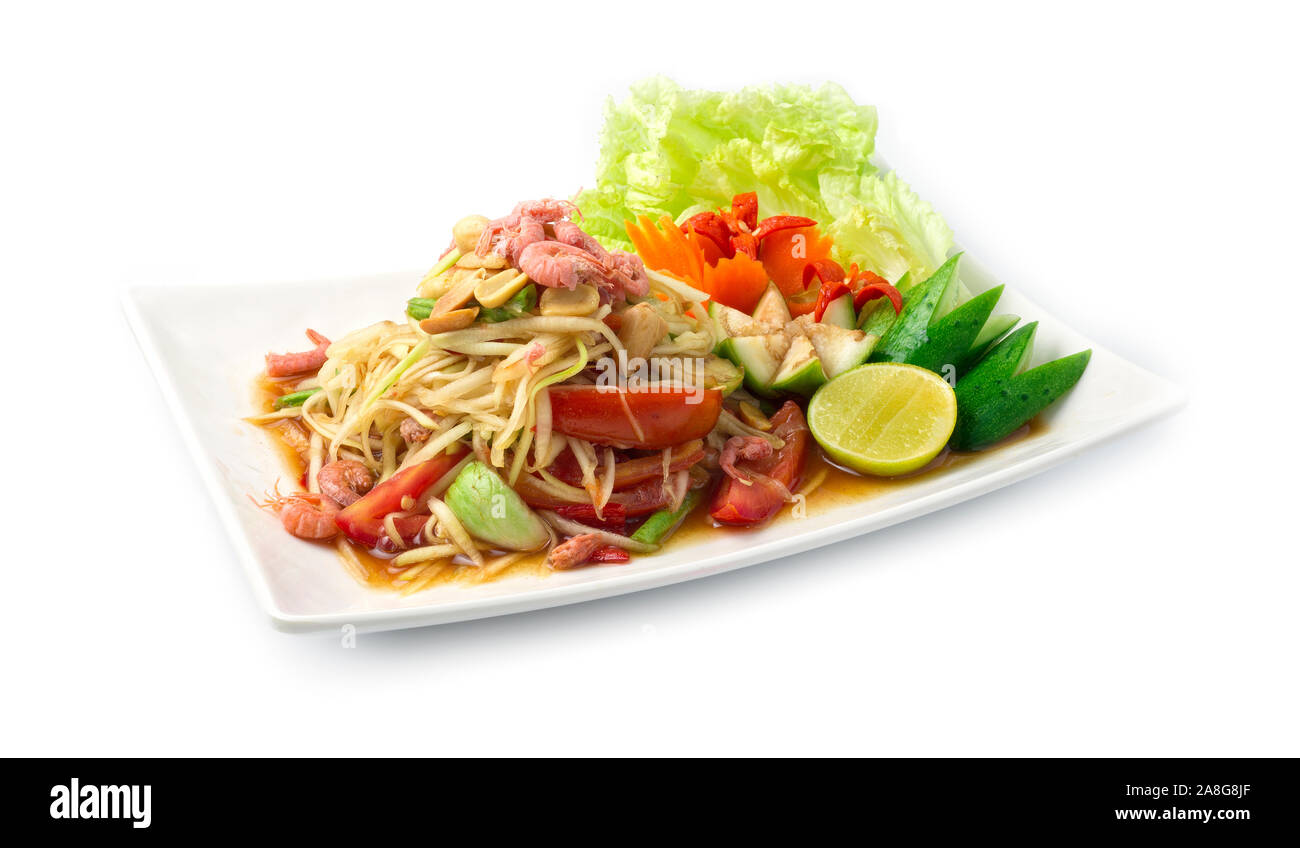 La papaia insalata piccante decapato in salsa di pesce il cibo thai piccante antipasto di stile popolare della Thailandia decorare con sculture di verdure e goodtasty goodfoo Foto Stock