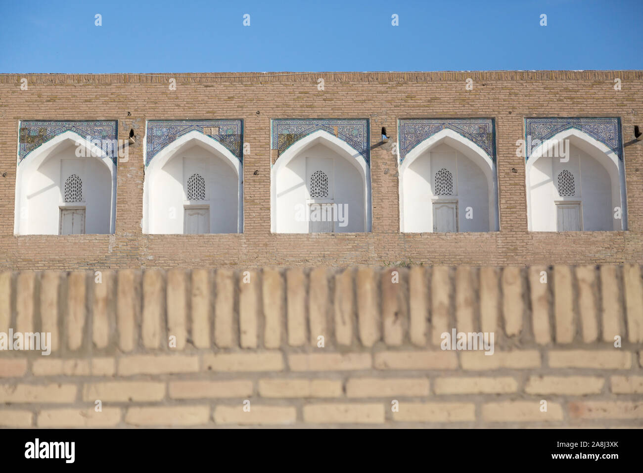 Madrassa archi a Khiva, Uzbekistan Foto Stock