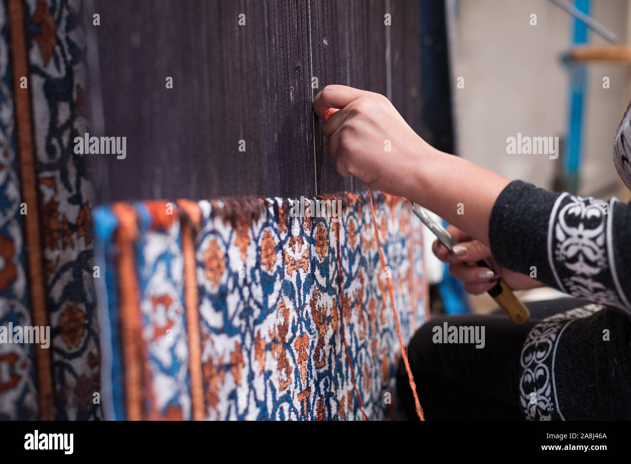 Rug Tessitore a Khiva, Uzbekistan Foto Stock