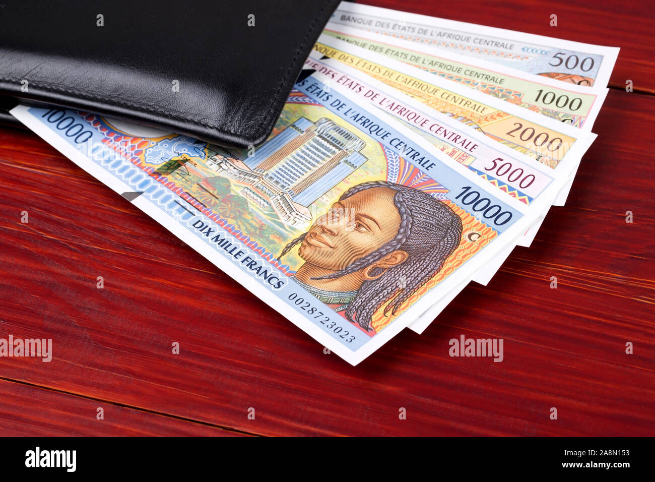 Vecchia Central African denaro nel portafoglio nero Foto Stock