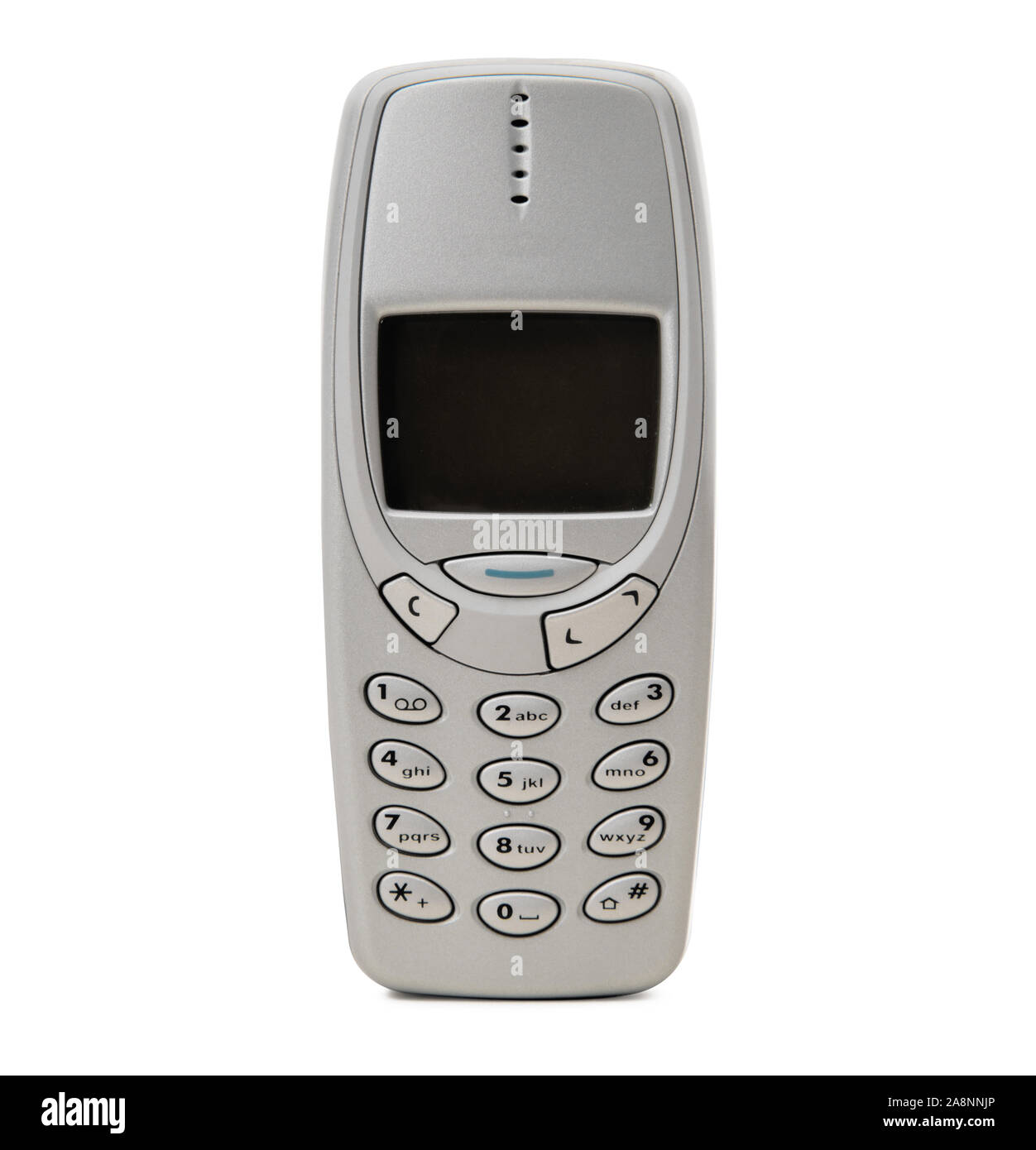 Vecchio telefono cellulare su sfondo bianco Foto Stock