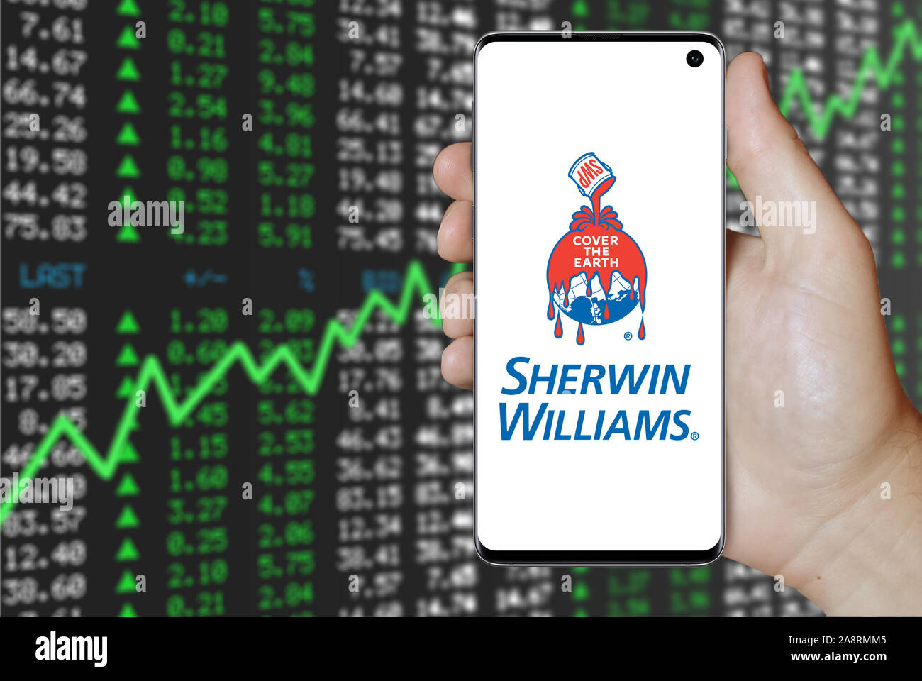 Il logo della società pubblica Sherwin-Williams visualizzata su uno smartphone. Positivo del mercato azionario sfondo. Credito: PIXDUCE Foto Stock