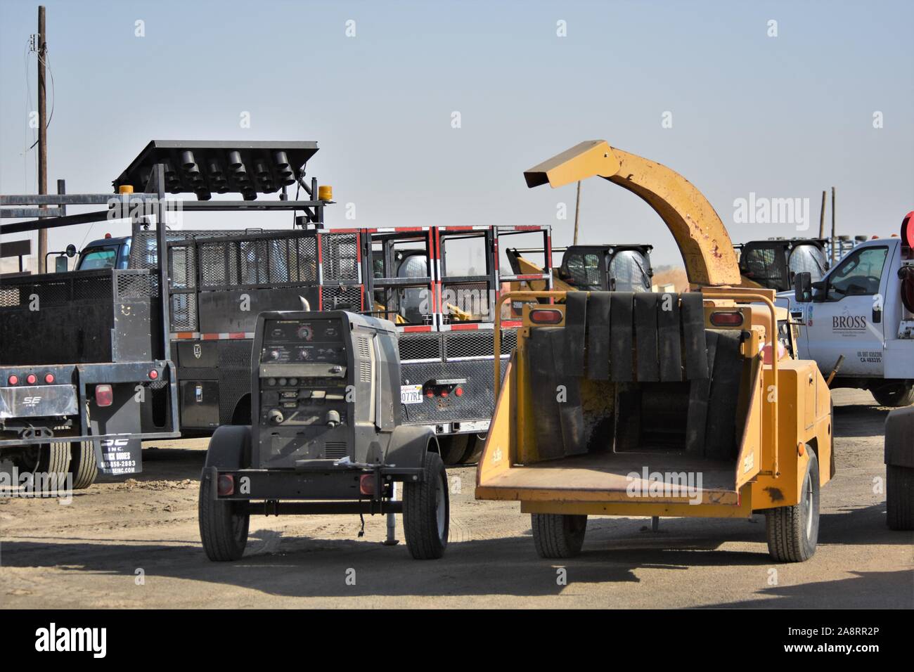 Gli articoli all'asta per la vendita e il riciclaggio dal piano stradale impresa edile contratti dopo aver finito di retroescavatore, zappatori, acqua camion, pneumatici, Deere, caricatori Foto Stock