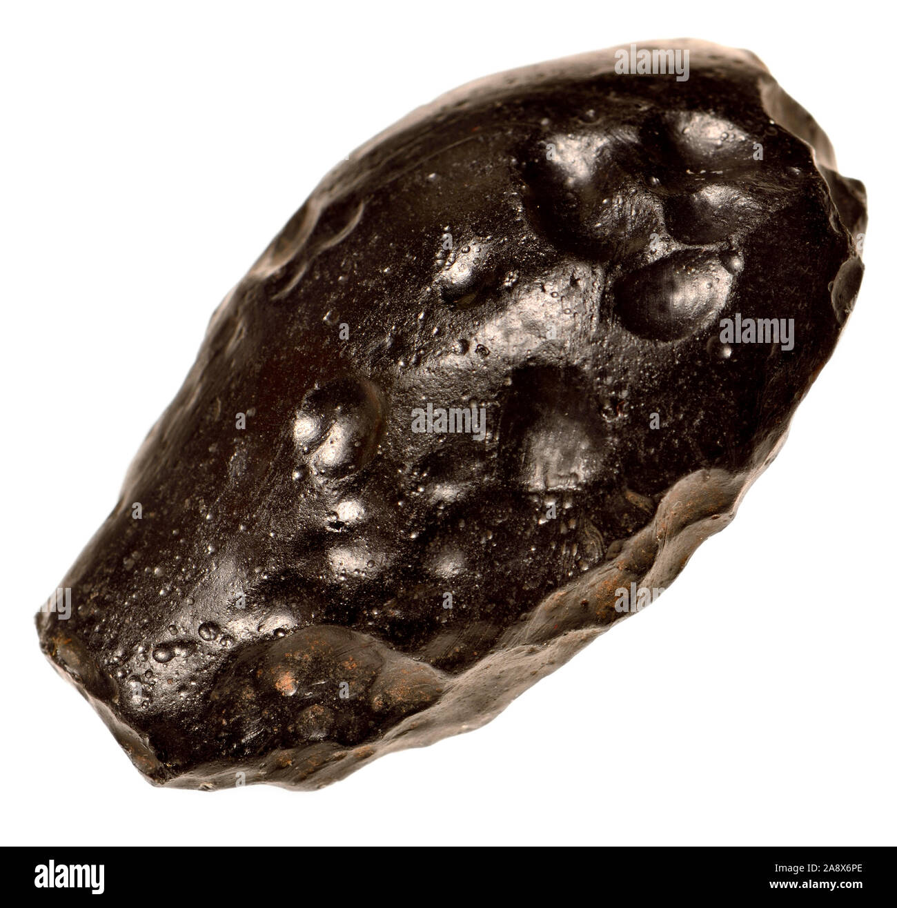 Indochinite /Tektite - metamorfico di vetro formata da rocce terrestri dopo fusione meteorite impatto e rapido raffreddamento Foto Stock