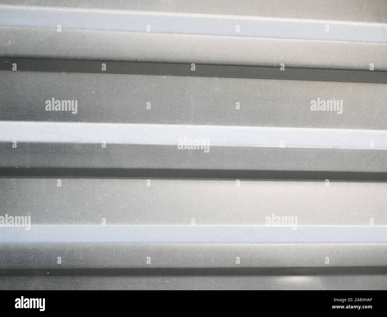 Recinzione metallica di close-up. Grigio nervata. Posto per un'iscrizione. sfondo per il progetto. Foto Stock