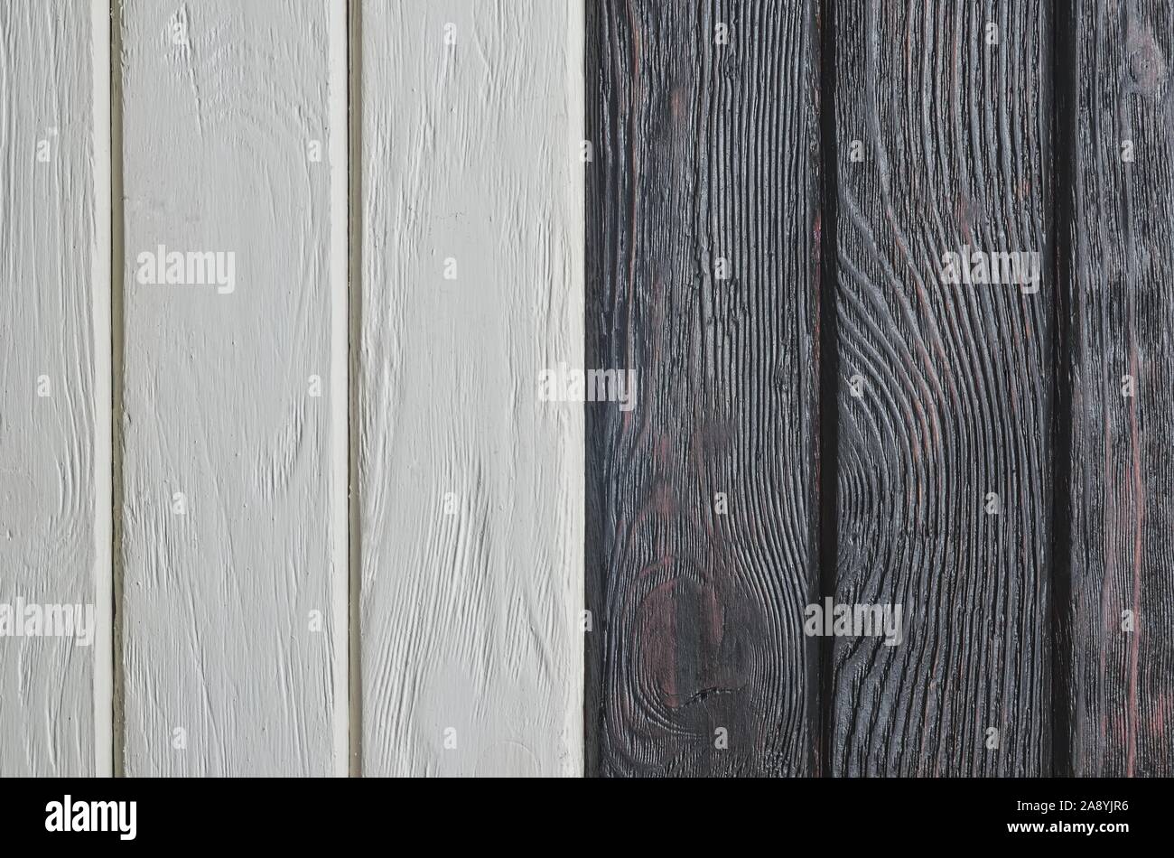 Concetto interessante per una texture di legno. Sfondo costituito da una combinazione di luce e buio boards. Foto Stock