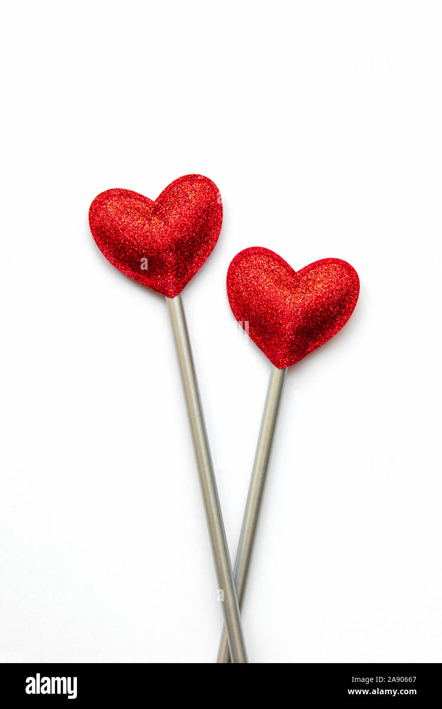 Amore due bacchette magiche. Il giorno di San Valentino del concetto. Foto Stock