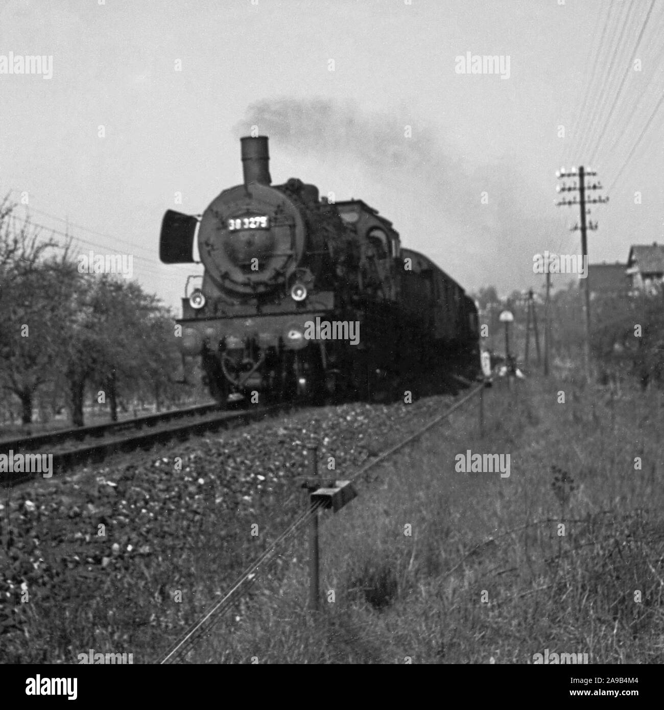 Locomotiva a vapore del tipo 38 in azione, Germania 1958 Foto Stock