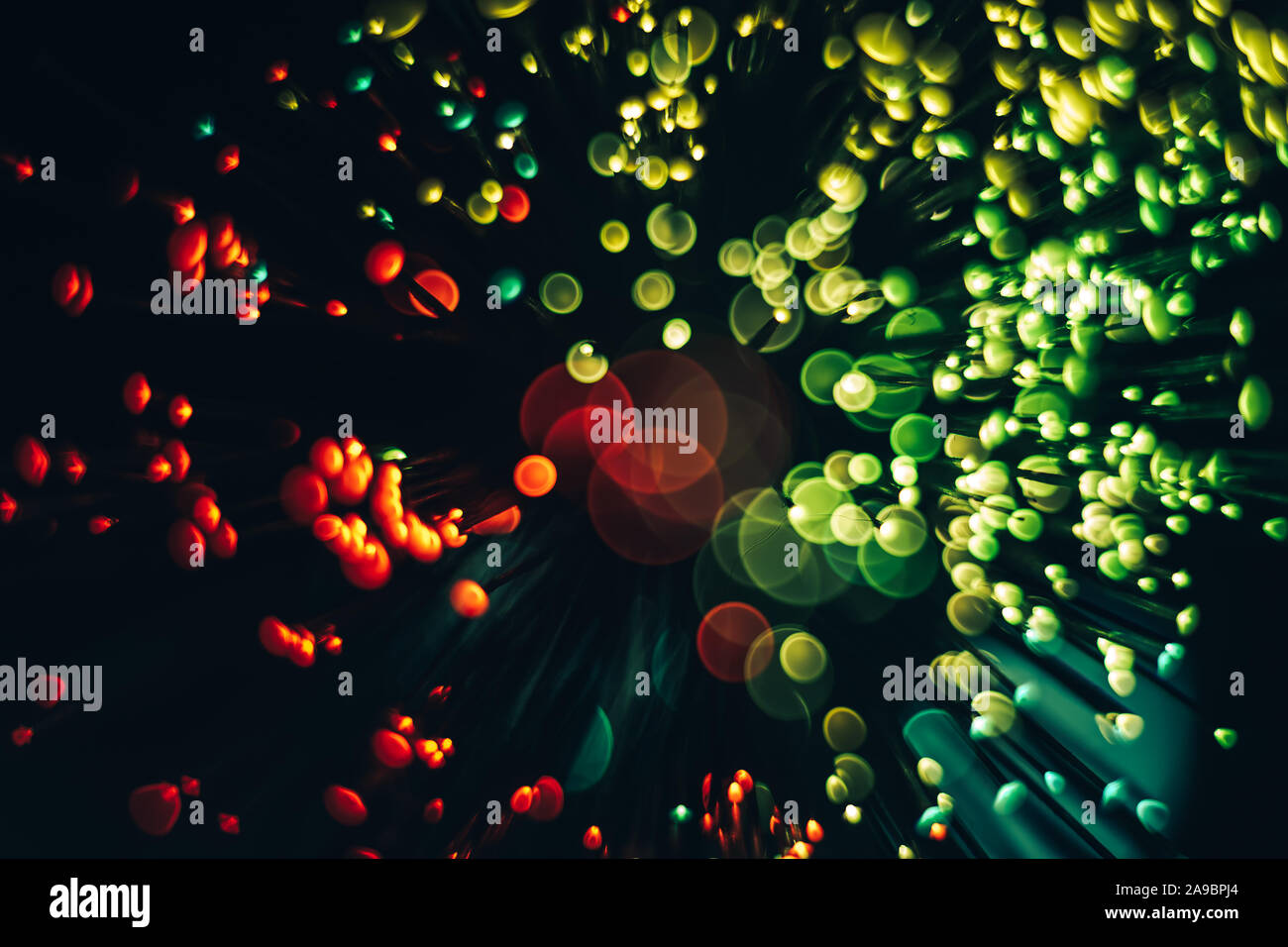 Bella ottico colore astratti bokeh nelle tenebre dello sfondo. Foto Stock