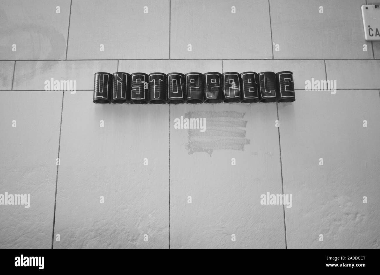 Arte urbana fatta di lattine Foto Stock