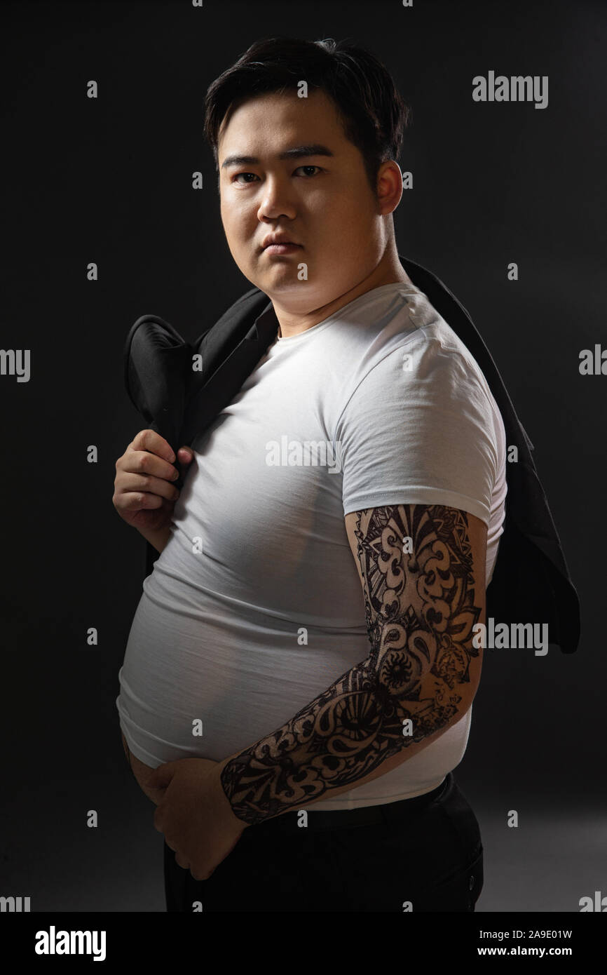 Tatuaggi, grasso di piccole dimensioni Foto Stock