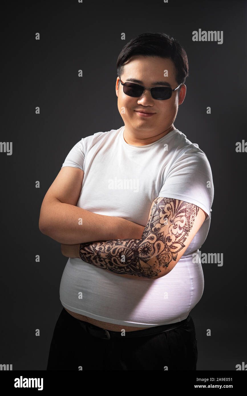 Tatuaggi, grasso di piccole dimensioni Foto Stock