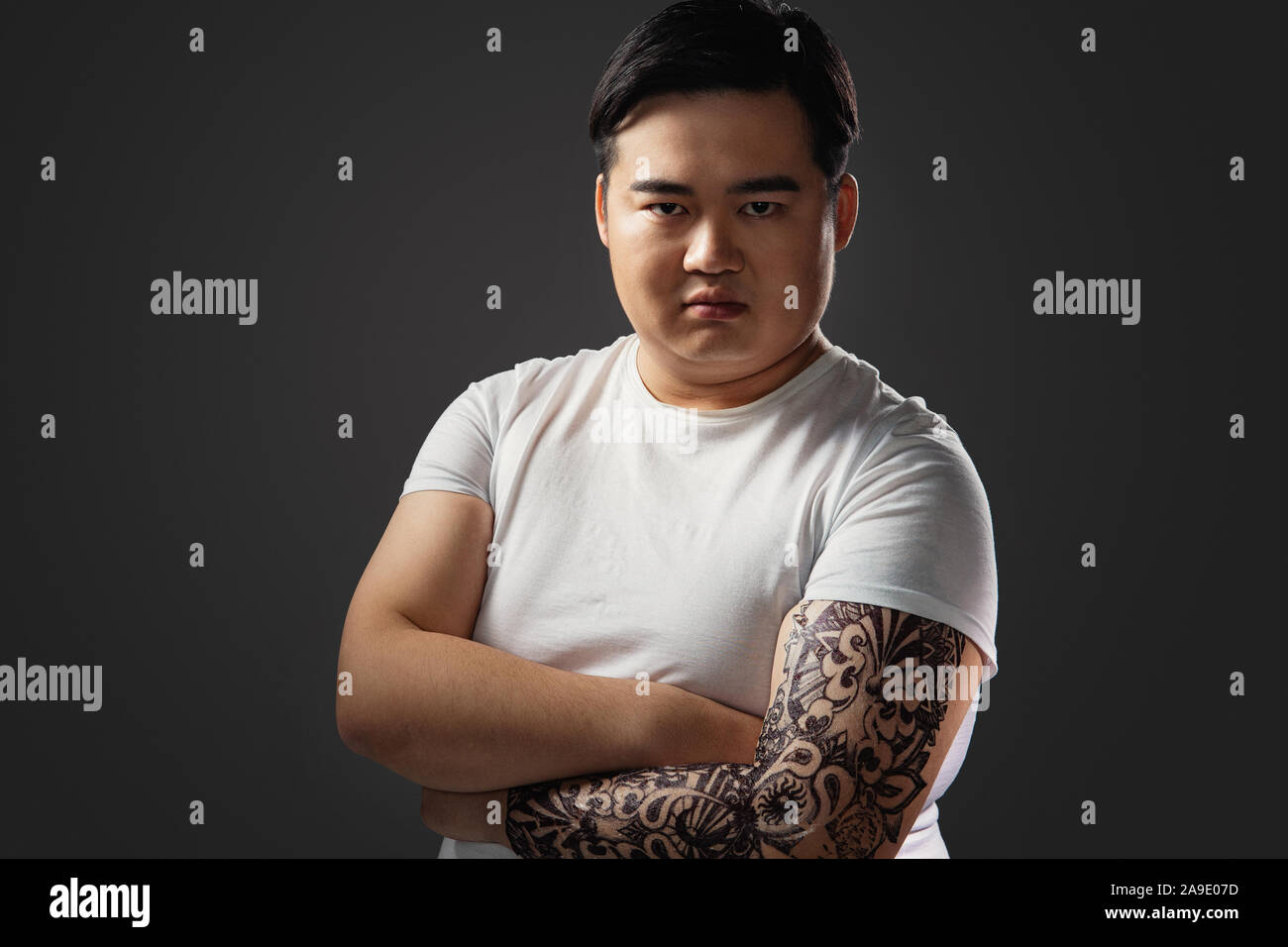 Tatuaggi, grasso di piccole dimensioni Foto Stock