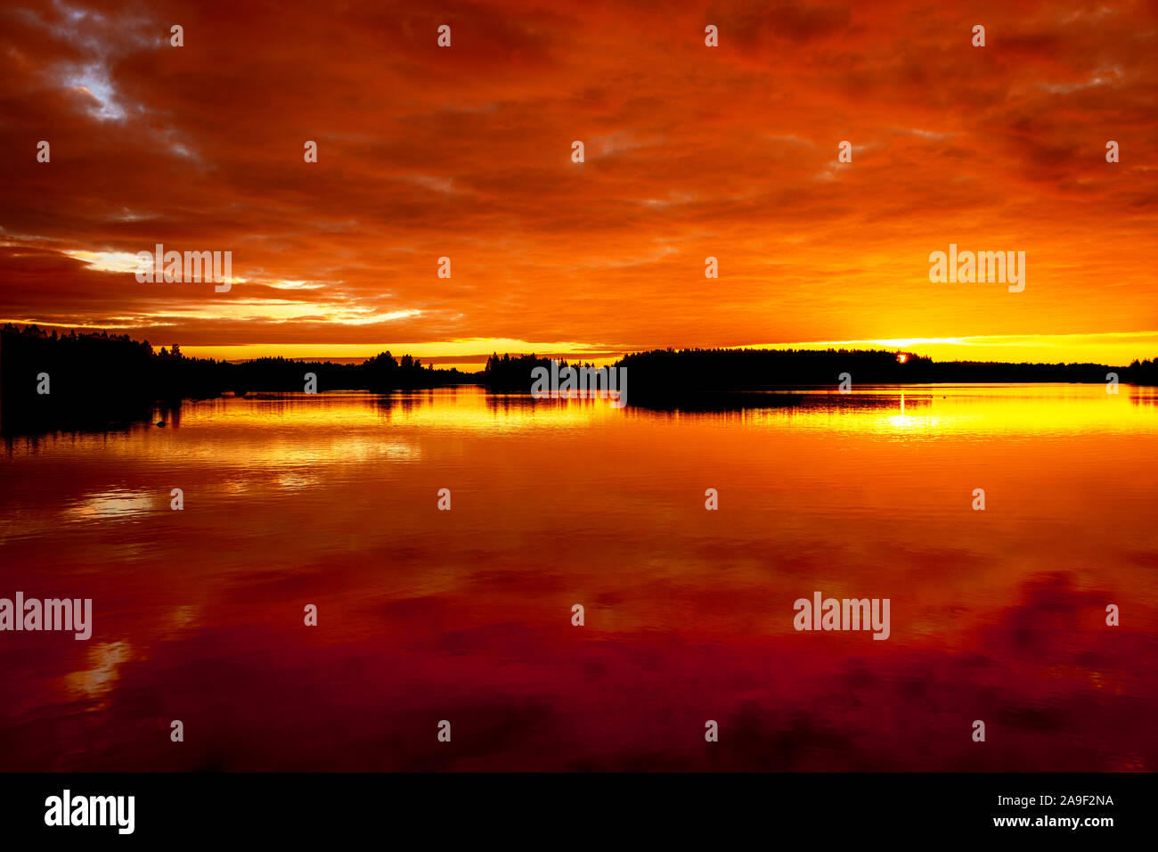 Tramonto sul lago Foto Stock