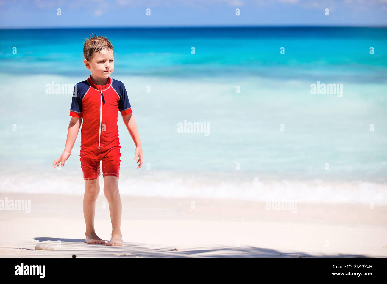 Familie am Strand, Seychellen, Indischer Ozean Foto Stock