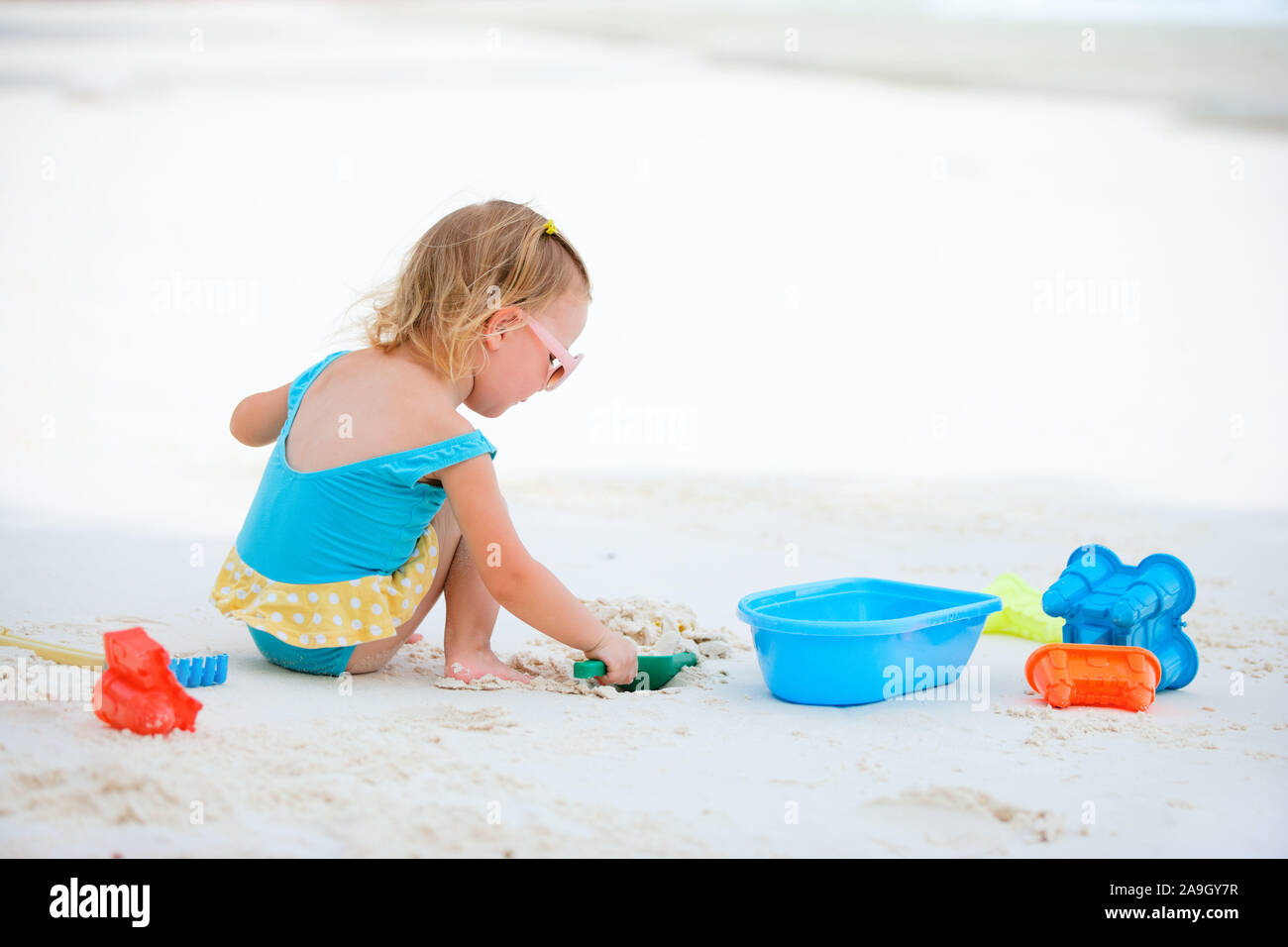 Spielen am Strand, Malediven, Foto Stock