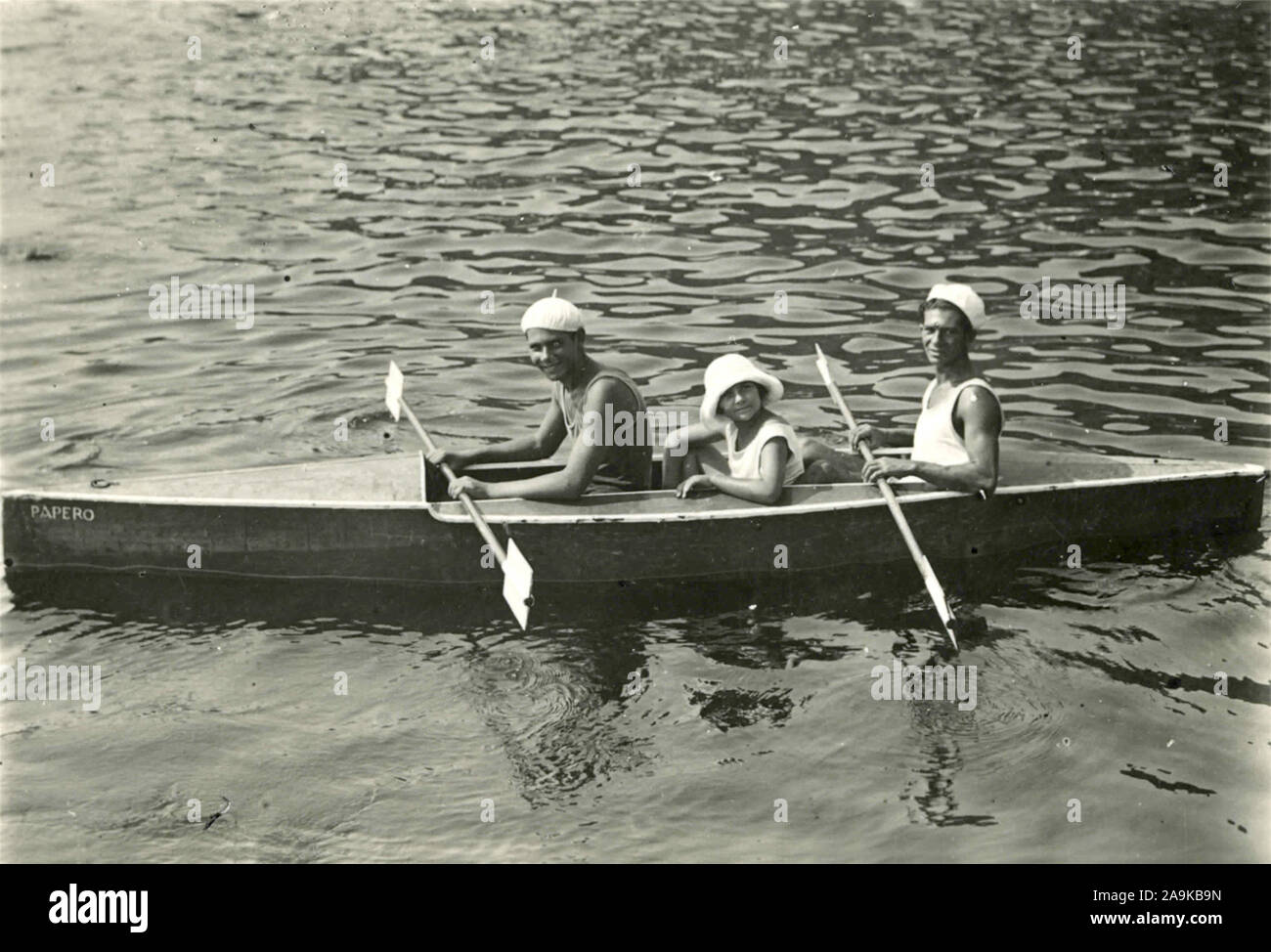 Tre Uomini in una barca, Italia Foto Stock