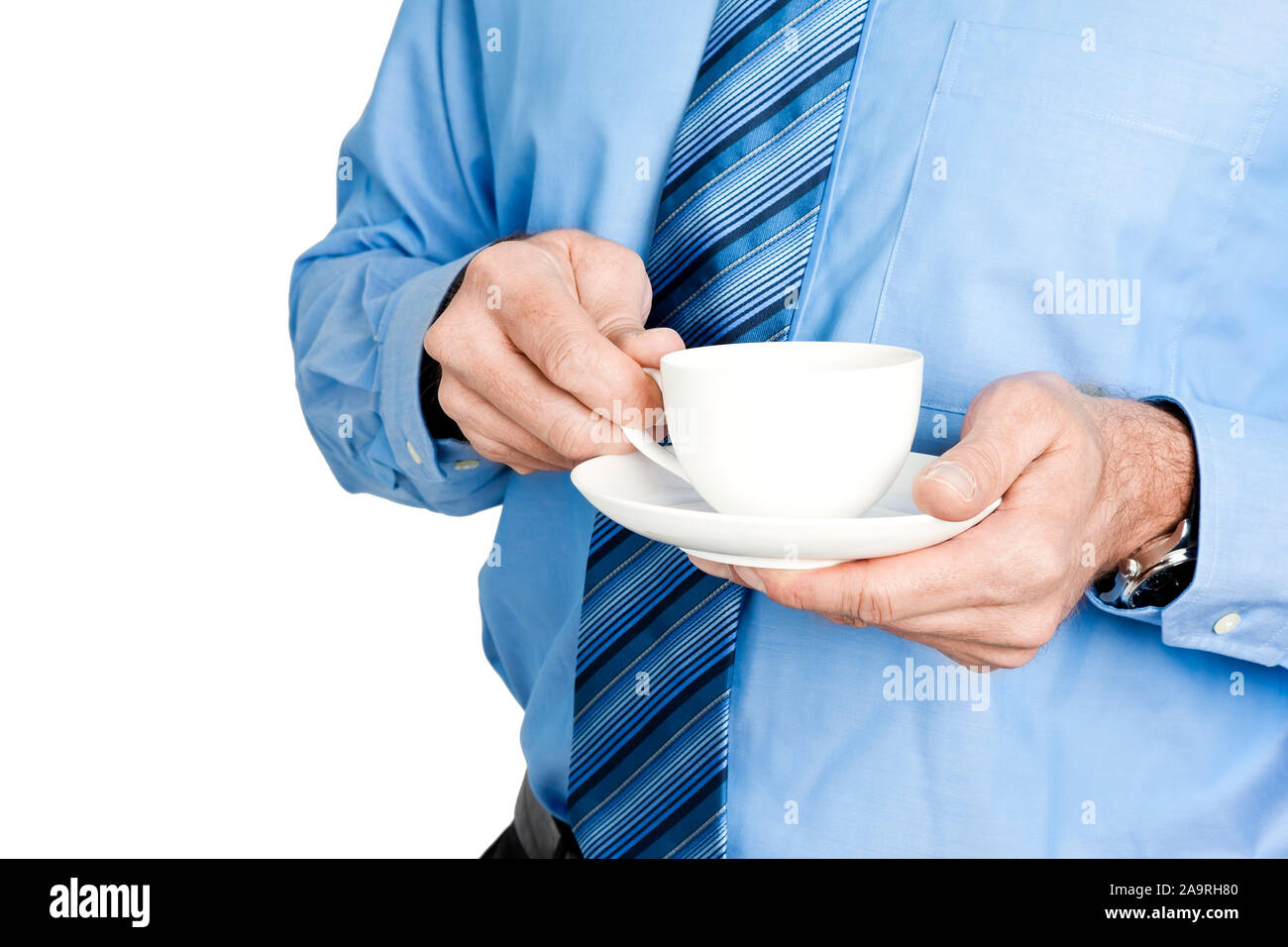 Una immagine di un bel business man con una tazza di caffè Foto Stock