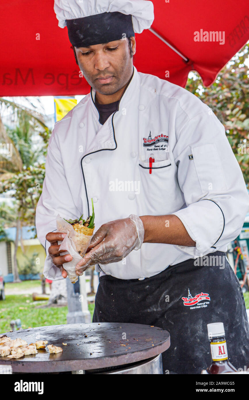 Miami Beach Florida,Festival of the Arts,artista,comunità uomo nero uomini maschio adulti,cuoco,chef,cucina,FL100207055 Foto Stock