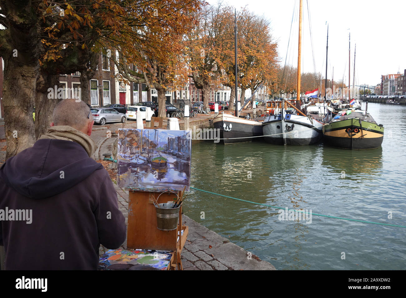 Pittore al lavoro, Wolwevershaven Dordrecht, Paesi Bassi, Europa Foto Stock