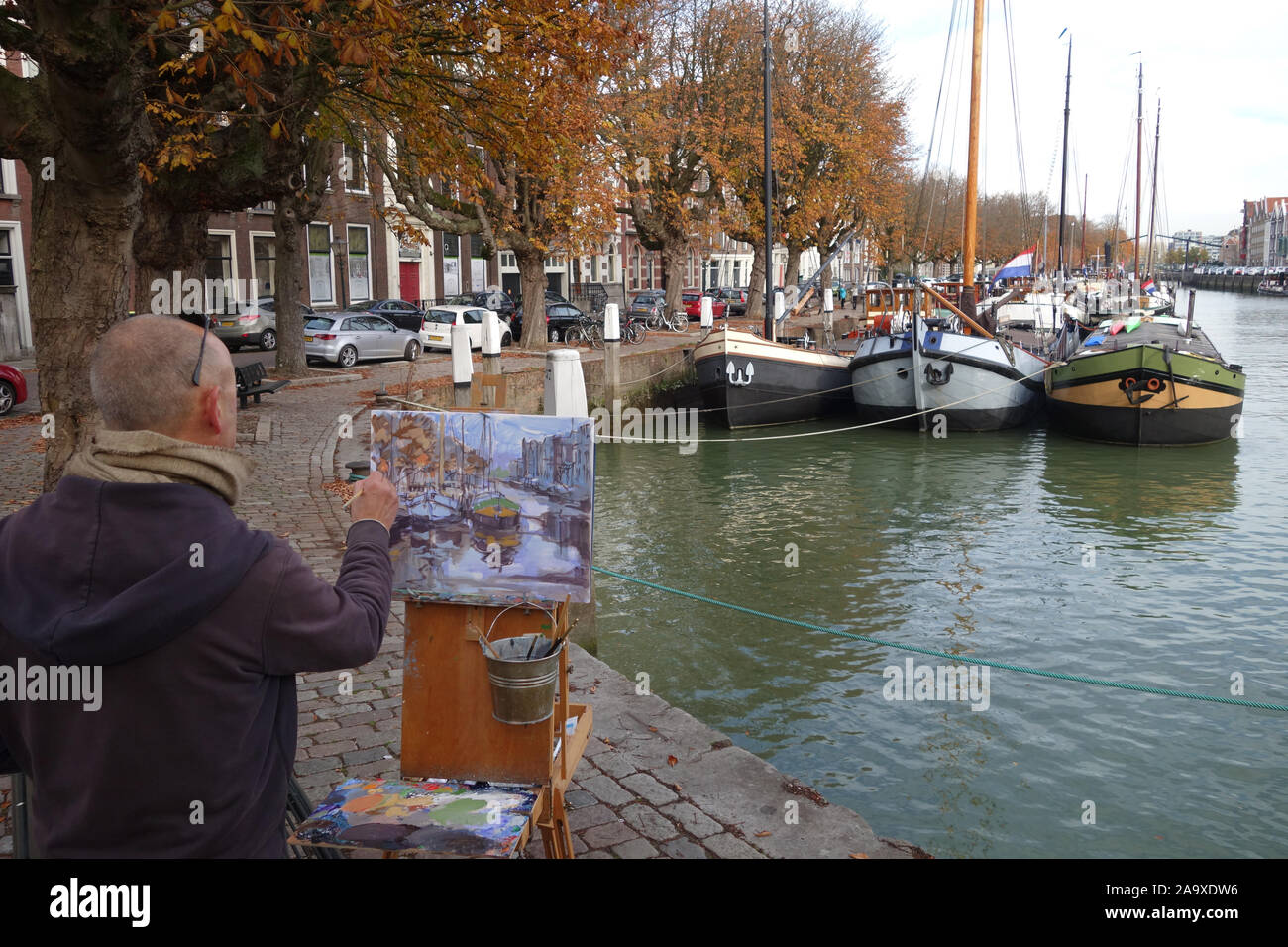 Pittore al lavoro, Wolwevershaven Dordrecht, Paesi Bassi, Europa Foto Stock