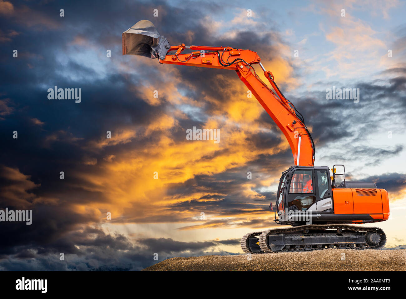 Escavatore su un sito in costruzione Foto Stock