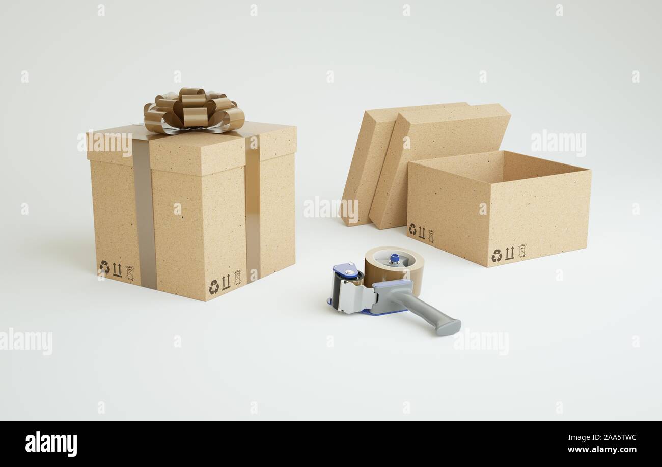 Cartone scatole regalo con il distributore di nastro della pistola. Gli ordini di regalo. Le spedizioni a terzi. Foto Stock