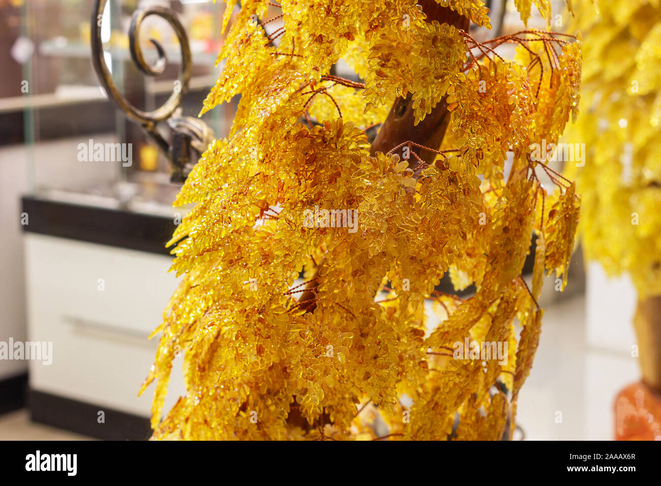 Struttura color ambra. rami di pietra gialla.accessorio di lusso gioielli Foto Stock
