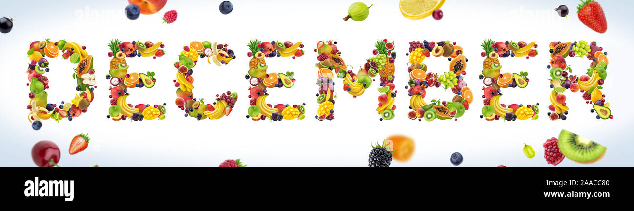 Dicembre parola fatta di tropicale e frutta esotica Foto Stock