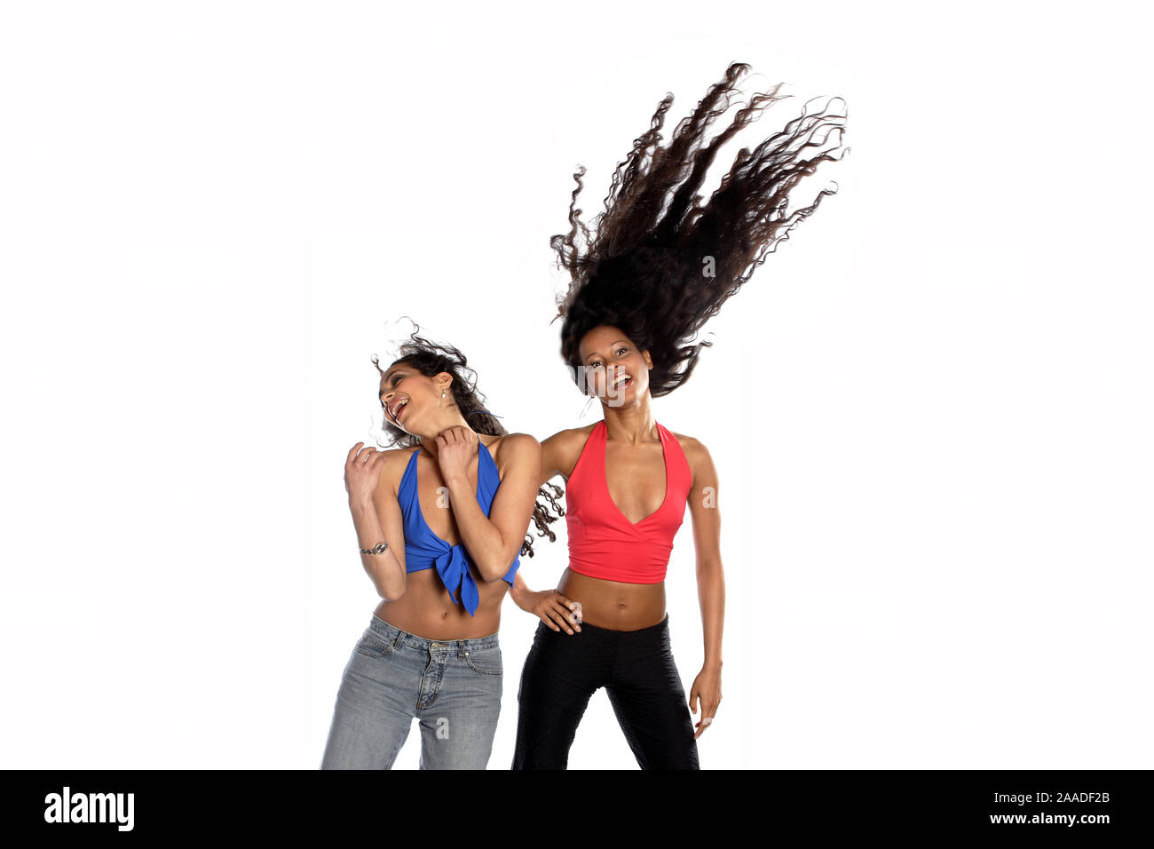 Zwei Maedchen tanzen zu Disco-Musik Foto Stock